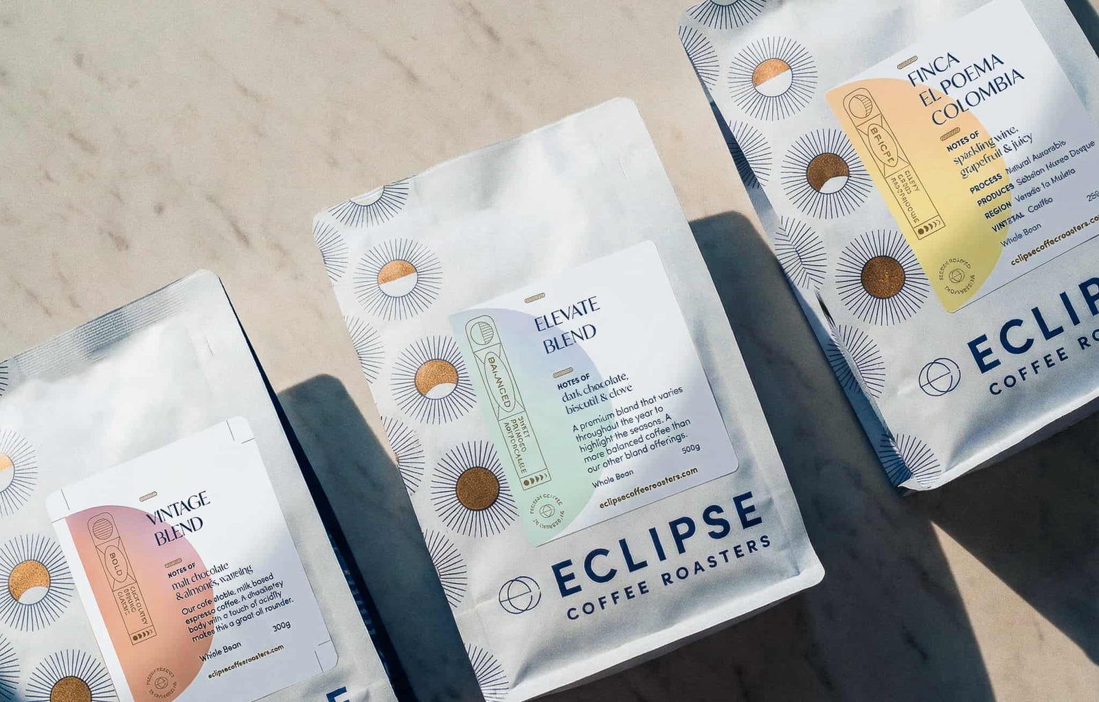 One coffee bean bag from each of Eclipse Coffee's three categories — Bright, Balanced, and Bold — Canmore Alberta